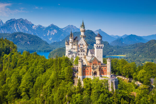 Famous Neuschwanstein Castle with scenic mountain landscape near Fssen, Bavaria, Germany