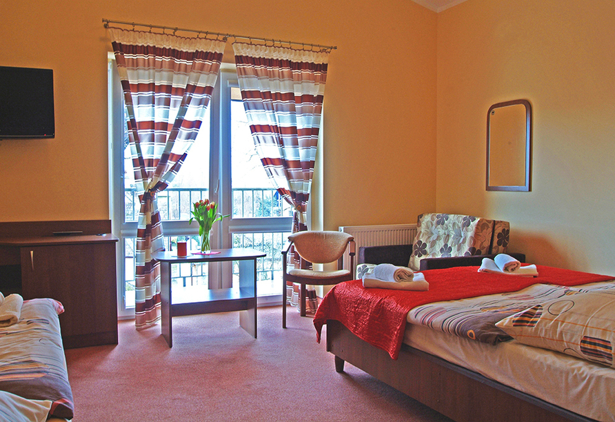 Beispiel eines Doppelzimmers mit Zustellbett im Hotel Rezydencja Korab