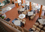 Im Wintergarten-Restaurant des Ferien Hotels Spreewald können Sie in heller Atmosphäre frühstücken.