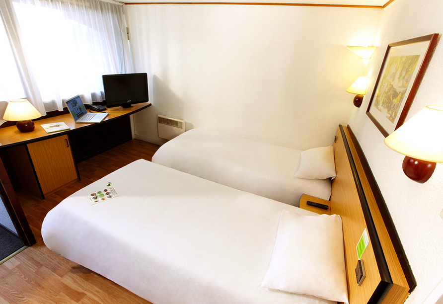 Beispielhafte Ansicht eines Doppelzimmers mit getrennten Betten