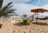 In der Beachbar des Hotels Hampton by Hilton Świnoujście können Sie sich zurücklehnen und den Strand genießen.