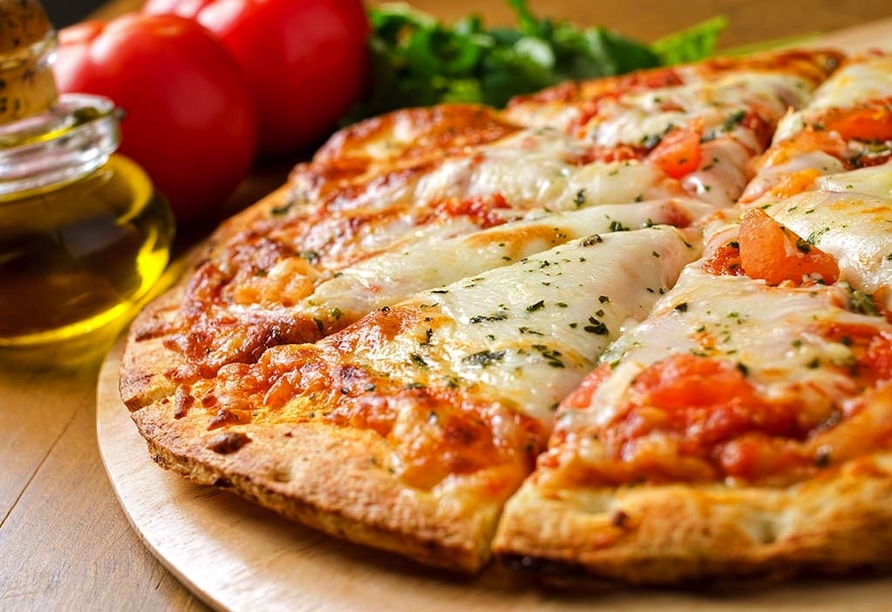 Pizza wird Sie bei Ihrem Urlaub in Italien überall begleiten.