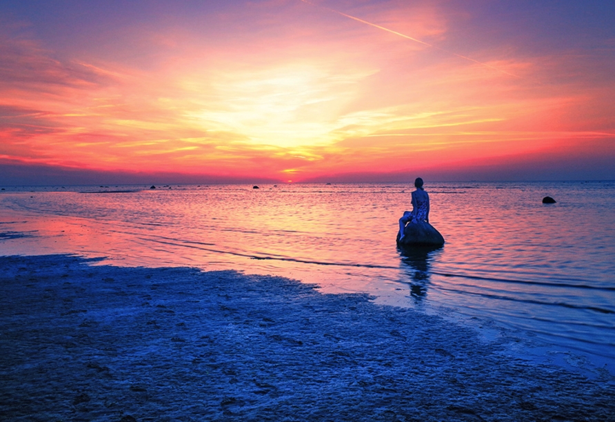 Träumen Sie sich davon bei wunderschönen Sonnenuntergängen an den Stränden von Poel.