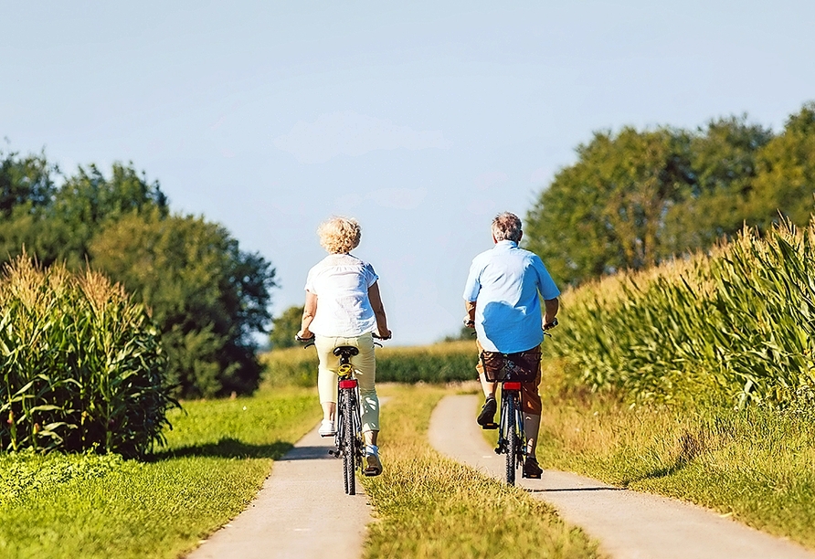 Erkunden Sie das Münsterland auf dem Fahrrad und spüren Sie den Fahrtwind im Gesicht.