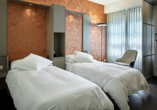 Beispiel eines Doppelzimmers Courtyard mit getrennten Betten im Hotel du Commerce in Basel