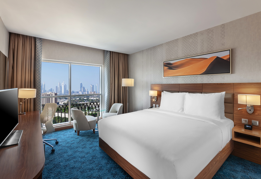 Wohlfühlmomente erwarten Sie in Ihrem Doppelzimmer (beispielhafte Ansicht) im Hotel Hilton Garden Inn Dubai Al Jadaf Culture Village.