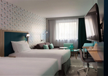 Beispiel eines Doppelzimmers mit getrennten Betten im Hotel Hampton by Hilton Paris Clichy