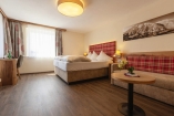 Beispiel eines Doppelzimmers Bergkristall im Wellnesshotel Kohlerhof in Fügen. 