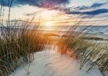 Genießen Sie die traumhaften Sonnenuntergänge an der polnischen Ostsee.
