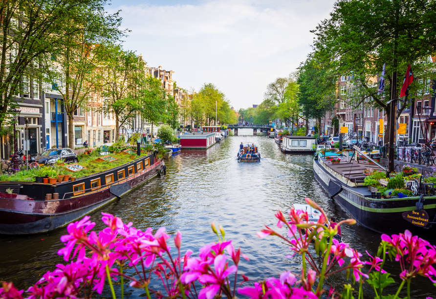 Erkunden Sie die Gassen und die Kanäle von Amsterdam.