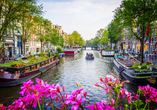 Erkunden Sie die Gassen und die Kanäle von Amsterdam.