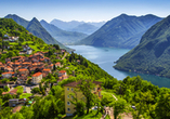 Die schöne Stadt Lugano liegt umgeben von einem malerischen Bergpanorama am Luganersee in der südlichen Schweiz.