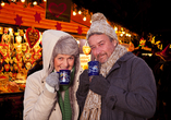 Genießen Sie eine kostenlose Tasse Glühwein auf dem Weihnachtsmarkt von Veitshöchheim.