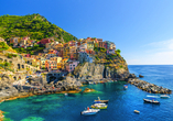 ...oder einen Ausflug zu den bunten Häusern von Cinque Terre unternehmen.