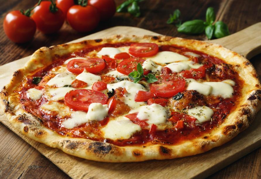 Frische hausgemachte italienische Pizza genießen Sie im Hotel.