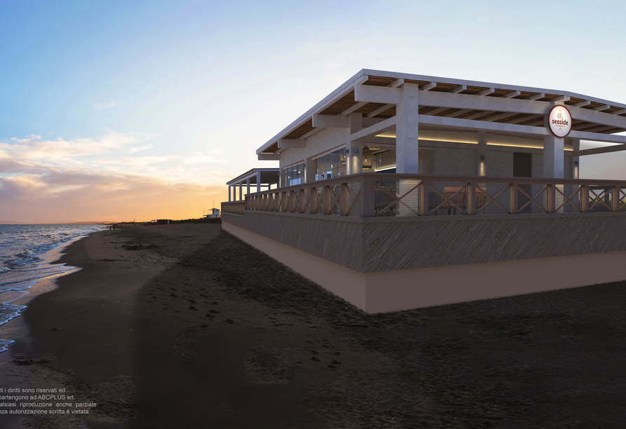 Im Seaside Restaurant Ihres Resorts erwarten Sie italienische Köstlichkeiten und Cocktails mit Meerblick.