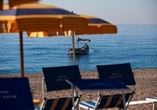 Sonne, Strand, azurblaues Wasser – am Strand Ihres Hotels können Sie entspannen.