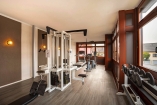 Powern Sie sich im Fitnessraum des aqualux Wellnesshotels aus.