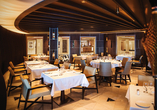 Genießen Sie an Bord eine Welt voller kulinarischer Optionen – hier: das italienische Restaurant Sabatini's. 