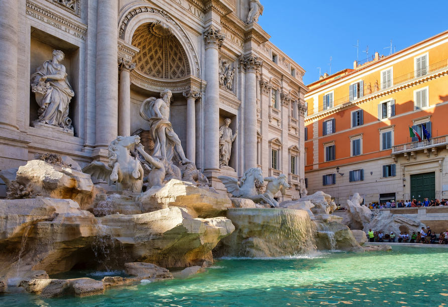 Werfen Sie eine Münze in den berühmten Trevi-Brunnen in Rom, das soll der Sage nach Glück bringen.