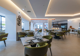 Im Restaurant des Hotels erwarten Sie genussvolle Momente in modernem Ambiente und entspannter Atmosphäre.