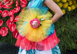 Farbenfrohe Kostüme erwarten Sie bei der Blumenparade.
