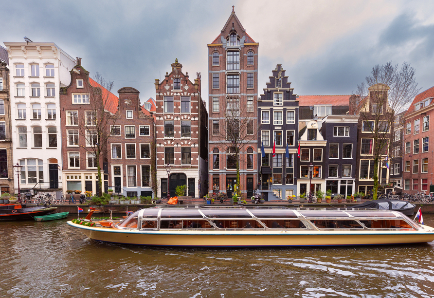 Lernen Sie das winterliche Amsterdam bei einer inkludierten Grachtenrundfahrt kennen.