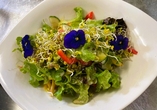 Jedes Gericht im Restaurant des DEVA Hotels Sonnenleiten wird kunstvoll angerichtet serviert – hier isst das Auge gerne mit!