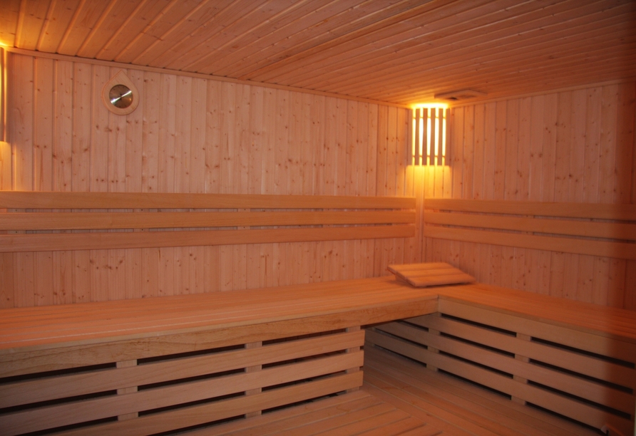 Entspannen Sie in der wohltuenden Sauna des Hotels.