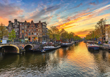 Durch die lange Liegezeit in Amsterdam können Sie auch den herrlichen Sonnenuntergang in der Stadt genießen.