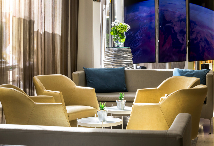 Entspannen Sie in Ihrem Urlaub in der Lounge des Leonardo Hotels Budapest.