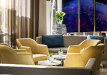 Entspannen Sie in Ihrem Urlaub in der Lounge des Leonardo Hotels Budapest.