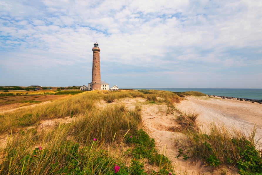 Besuchen Sie den Leuchtturm in Skagen und tauchen Sie in die Geschichte des dänischen Küstenorts ein.
