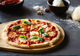 Eine typisch italienische Pizza darf während Ihrer Reise nicht fehlen!