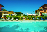 Ziehen Sie im Pool Ihre Bahnen und genießen Sie die Sonne Italiens!
