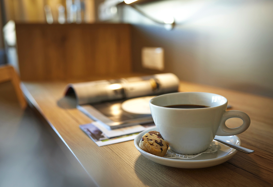 Genießen Sie Ihre Auszeit bei einem wärmenden Kaffee. 