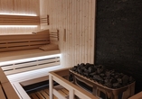 Entspannen Sie in der gemütlichen Sauna.