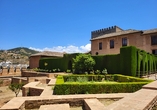Erkunden Sie das wunderschöne Gebäude- und Parkensemble der Alhambra.