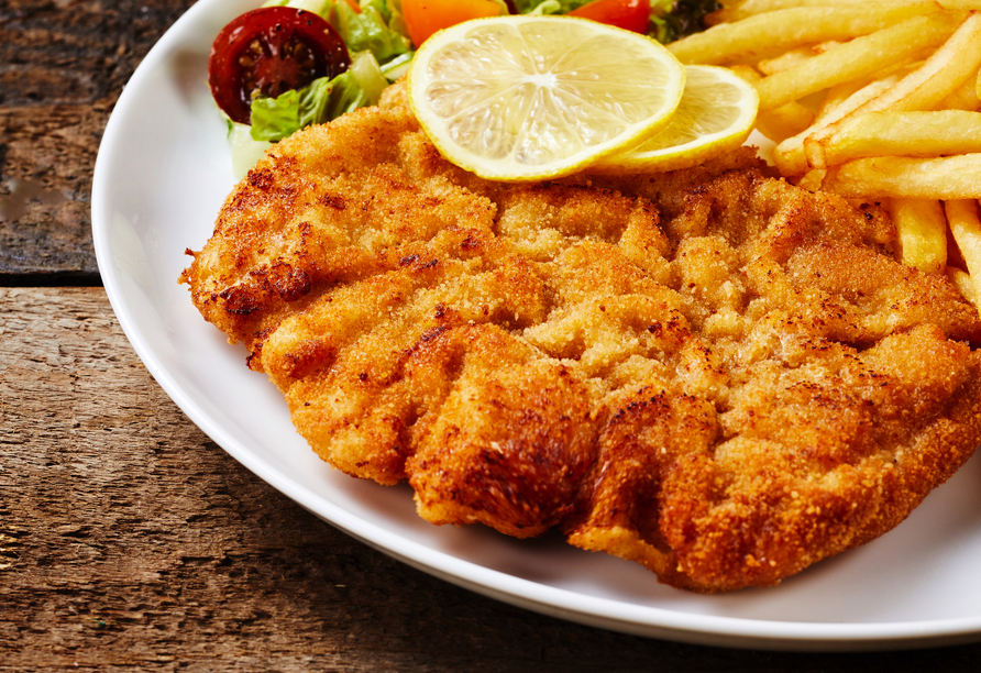 Leckeres Essen genießen Sie im Restaurant „Kartoffelscheune”.