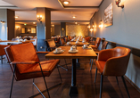 Im Restaurant des Hotels genießen Sie köstliche Speisen.