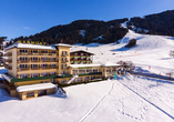 Das Hotel Harfenwirt heißt Sie in einer idyllischen Winterlandschaft herzlich willkommen.