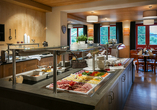 Freuen Sie sich am Morgen auf ein reichhaltiges Frühstücksbuffet.