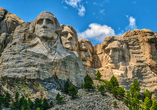 Die US-Präsidenten Washington, Jefferson, Roosevelt und Lincoln wurden in Mount Rushmore in den Granit gemeißelt.