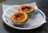 Pasteis de Nata – die portugiesischen Blätterteig-Törtchen mit Vanillecreme sind jede Sünde wert.