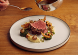 Kulinarische Gaumenfreuden erwarten Sie im Restaurant.