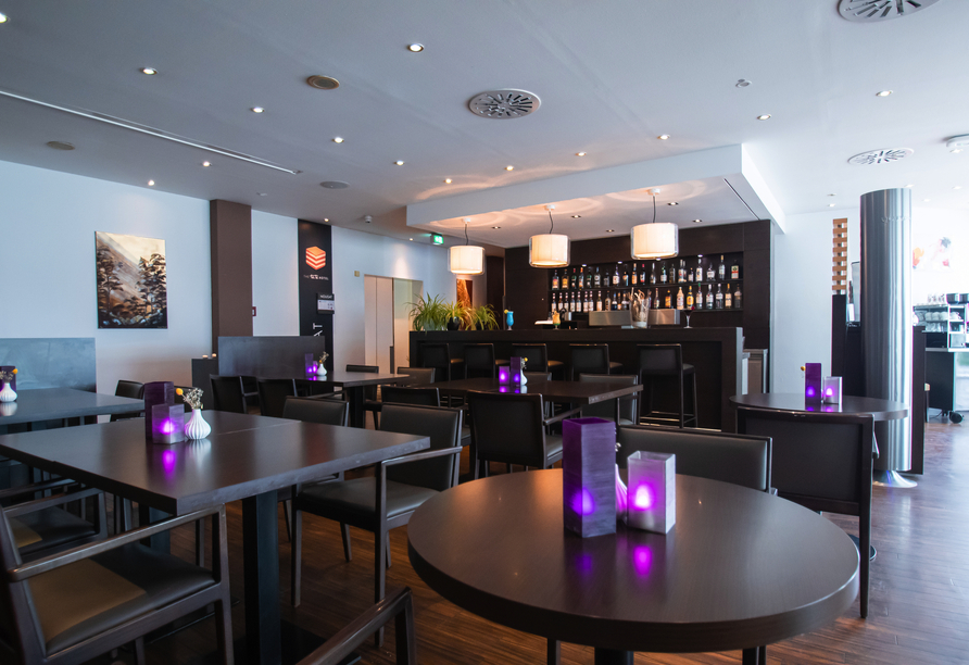 Lassen Sie den Tag gemütlich an der Bar ausklingen.