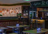 Das hoteleigene Restaurant verwöhnt Sie mit feinen Gerichten.