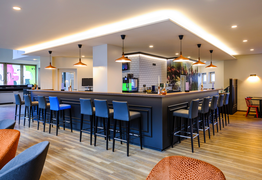 Genießen Sie ein kühles Getränk an der Hotelbar.