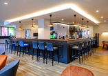 Genießen Sie ein kühles Getränk an der Hotelbar.
