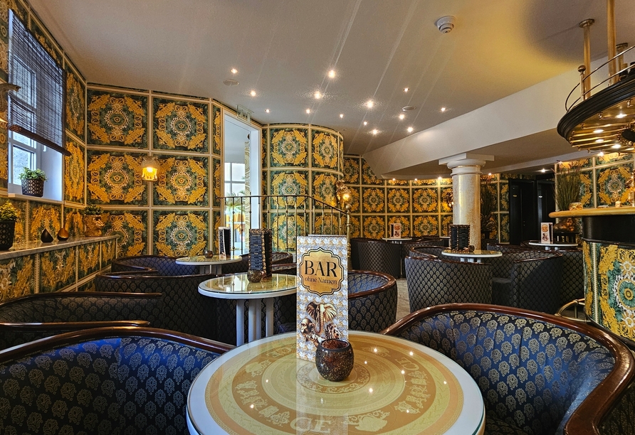 Lassen Sie den Tag bei einem leckeren Cocktail in der Bar des Hotels ausklingen.